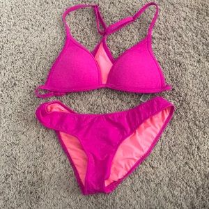 magenta swim suit with razorback